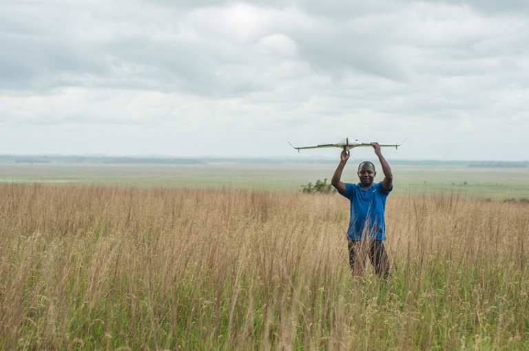 Preparing a drone for flight in Congo's Tchimpounga Nature Reserve. Courtesy of ConservationDrones.org