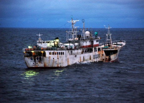 A Taiwanese-flagged fishing vessel suspected of illegal fishing activity, moves through the water before being boarded. Image courtesy of the U.S. Coast Guard/Shawn Eggert