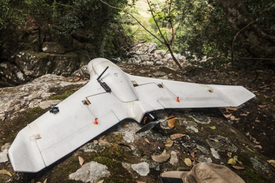 X5 fixed-wing UAV on forest floor